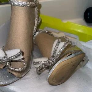 Gianni Bini HaydnTwo Glitter Pearl Bow Studded Ankle Strap Lucite Heel Dress Sandals, Womens, 7M, Silver - Dillard's Exclusive Gianni Bini HaydnTwo Glitter Pearl Bow Studded Ankle Strap Lucite Heel Dress Sandals, Womens, 7M, Silver - Dillard's Exclusive